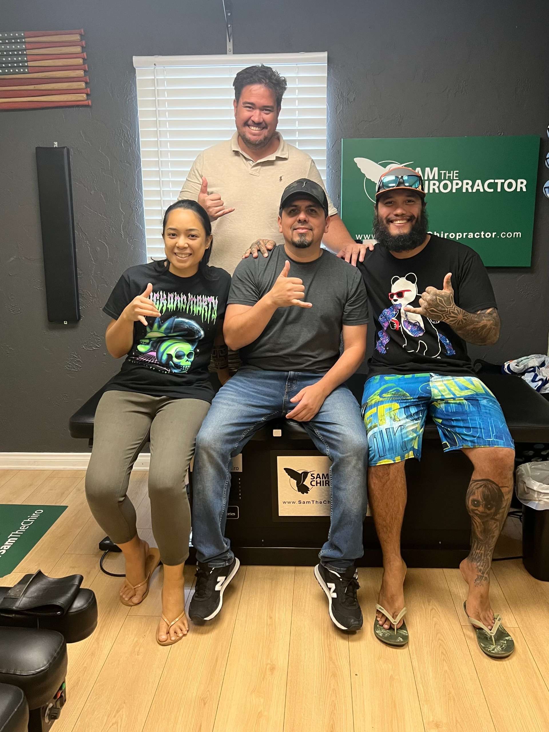 Happy patients with Dr. Sam after their adjustment